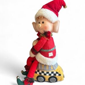 Festive Elf Toy with Red and Yellow Accents